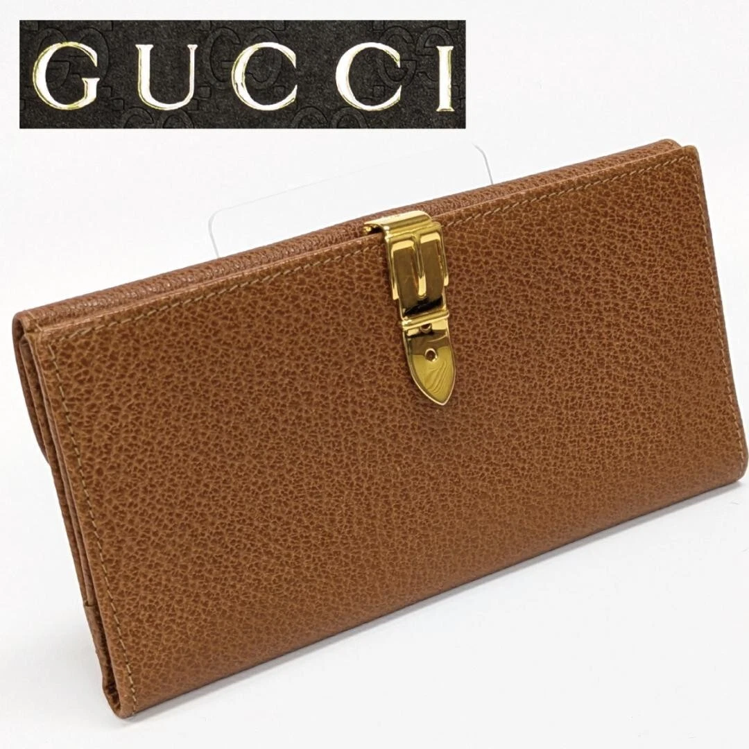 Portefeuille Gucci vintage en cuir avec boucle de ceinture dorée