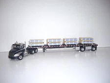 DCP FIRST GEAR 1/64 MACK PINNACLE DAYCAB WITH 53' WILSON FB w/WRAPPED TUBE LOAD