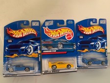 3 Hot Wheels Ferrari F40: 2 #209 Blue PR5 + 1 yellow 1999 #27089. Rear End Opens
