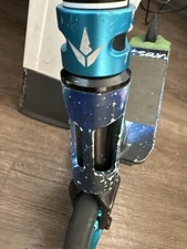 Custom Galaxy Scooter sticker bombed hand bar with blue wheels