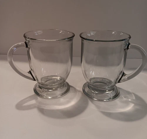 2 Vintage Clear Anchor Hocking large Glass footed Mugs coffee cocoa  16 oz.