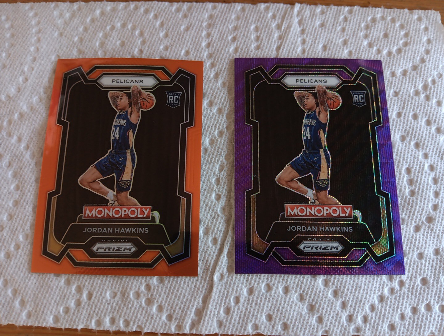 2023-24 Panini Prizm Monopoly Jordan Hawkins Rc Orange Prizm RC #56 /124 + Purpl