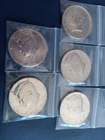 (A)  5 NIFC Kennedy Half Dollars