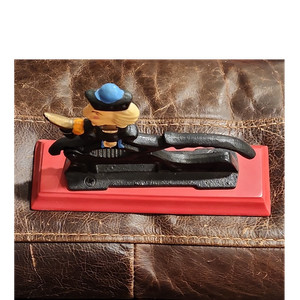 Vintage Cast Iron Nutcracker Painted Figure Red Base Black Blue Yellow