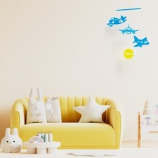 Adorable hanging mobile three cute airplanes in motion perfect for kid's rooms