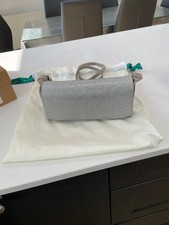 Unisa silver bag with taupe suede trim. Matching shoes available. Used once.