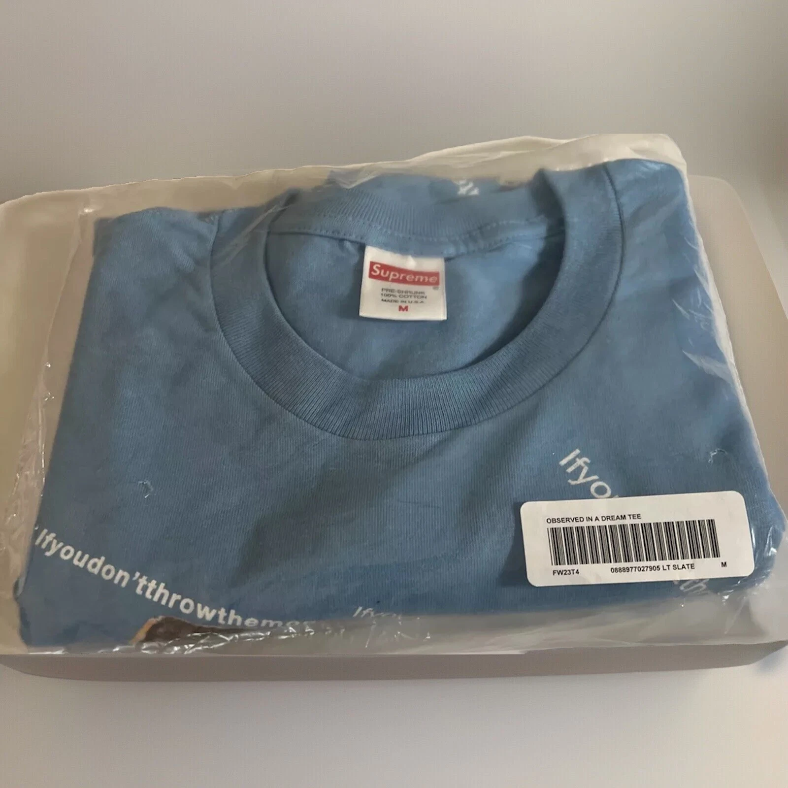 SUPREME/BÉNÉDICTION OBSERVÉE EN RÊVE TEE LT ARDOISE TAILLE MEDIUM (FW23 SEMAINE 12 AUTHENTIQUE