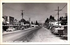 STREET VIEW SWEETHOME, OREGON : SIGNS INCLUDE COCA COLA & QUAKER STATE : TRAILER
