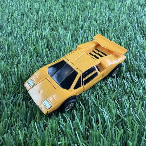 Vintage Gobots Pocket Puzzler Yellow Lamborghini Countach Bandai 1984