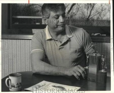 1988 Press Photo Gary Stucci with one of his trophies from pigeon racing in MN