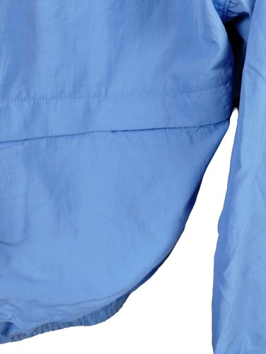 Chaqueta cortavientos pulóver con capucha azul Reebok juvenil talla M nailon poliéster - Imagen 12 de 14