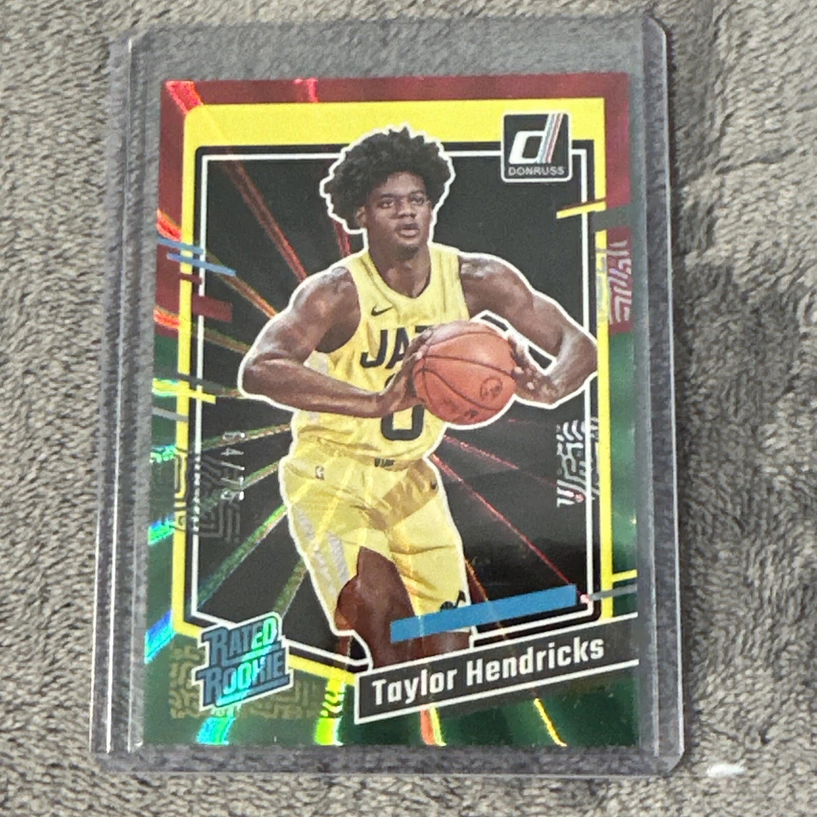 Taylor Hendricks RC #'d 64/75, 2023-24 Donruss #208 Red & Green Laser Utah Jazz