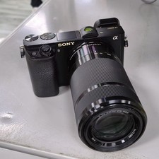 Sony Alpha A6000 24.3MP Mirrorless Digital Camera w/ 55-210mm Lens -95 NEW
