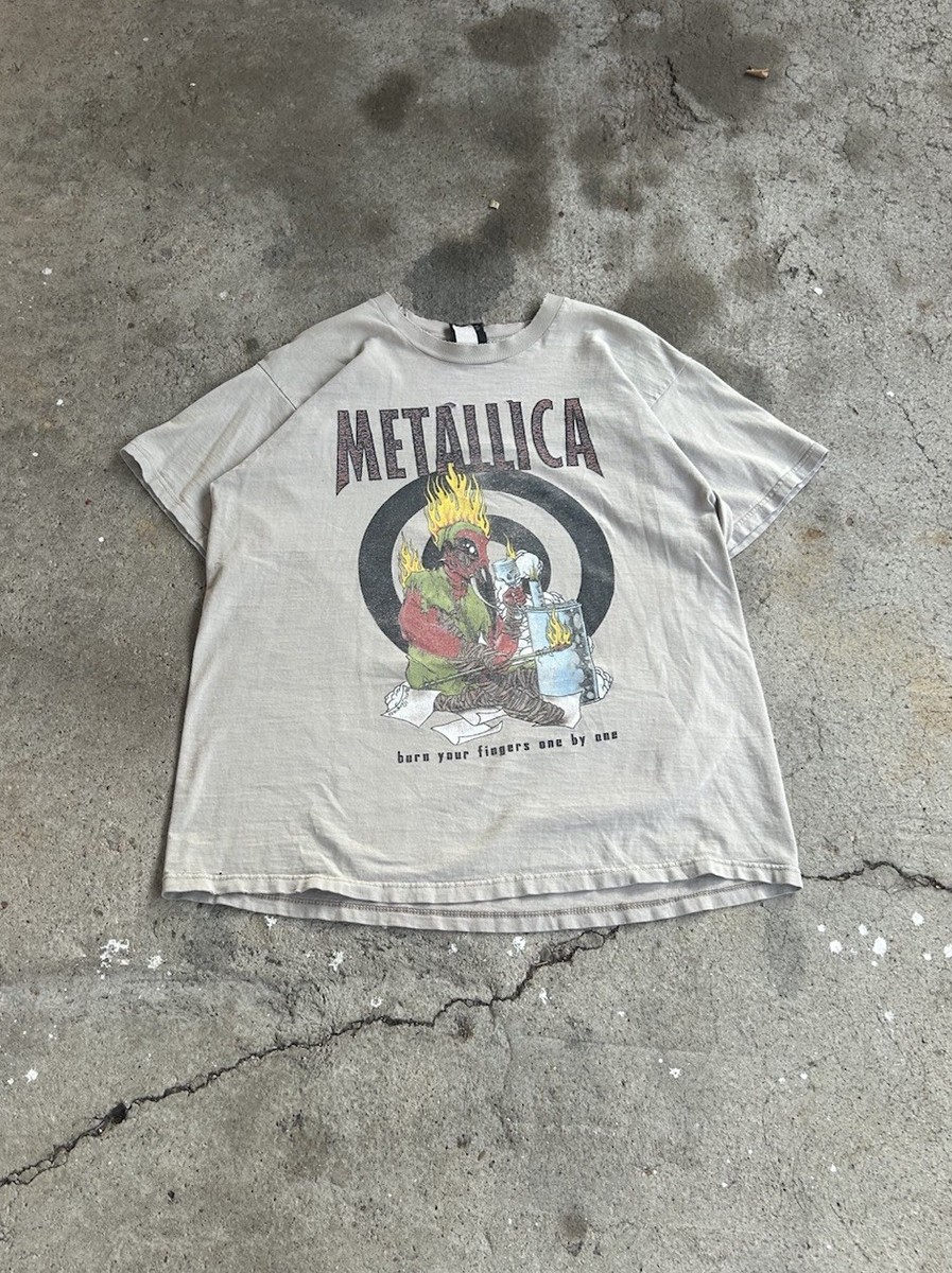 Vintage 90s distressed tan Metallica band tee on the giant tag