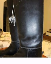 Black knee high riding boots