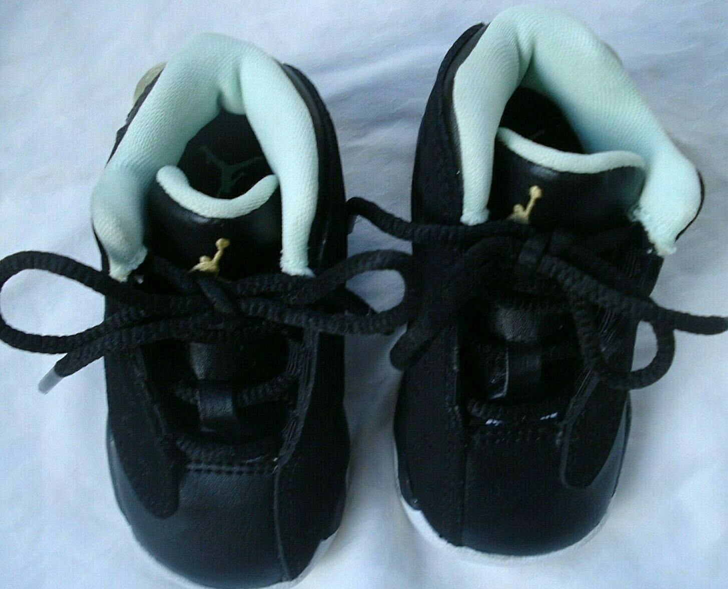 black and gold baby jordans