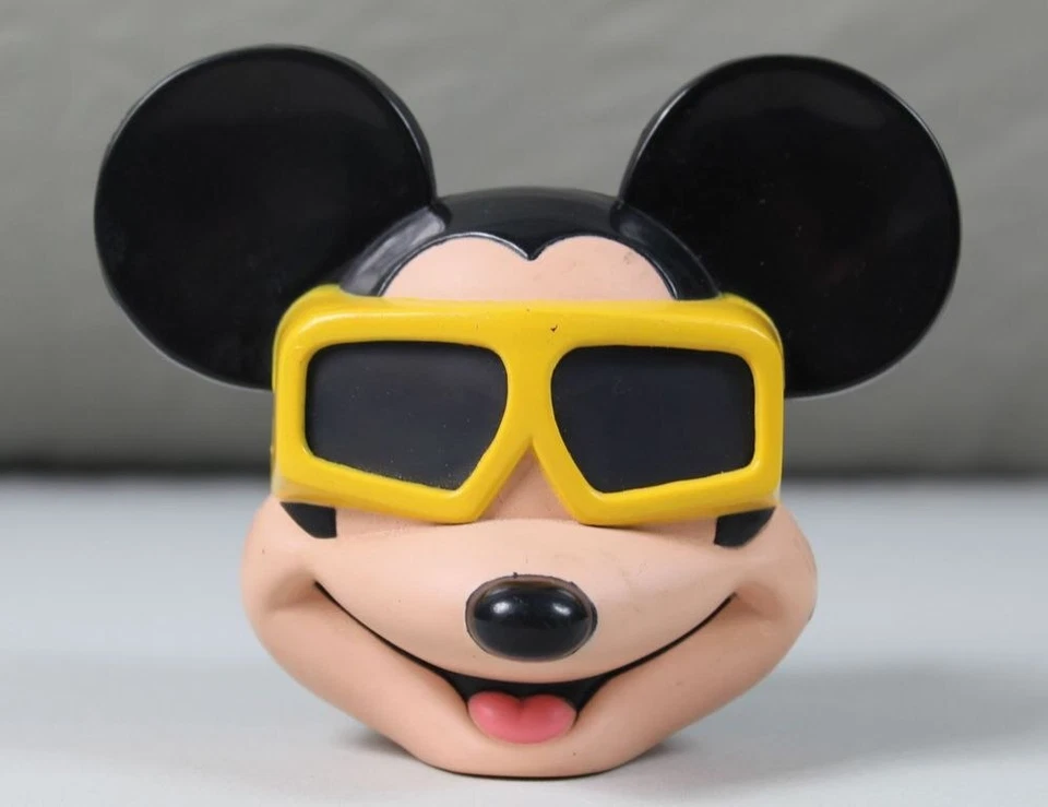 kleines Plastiskop - Micky Mouse Kopf mit 7 Ansichten - Disneyland Paris /S310 - Bild 1 von 4