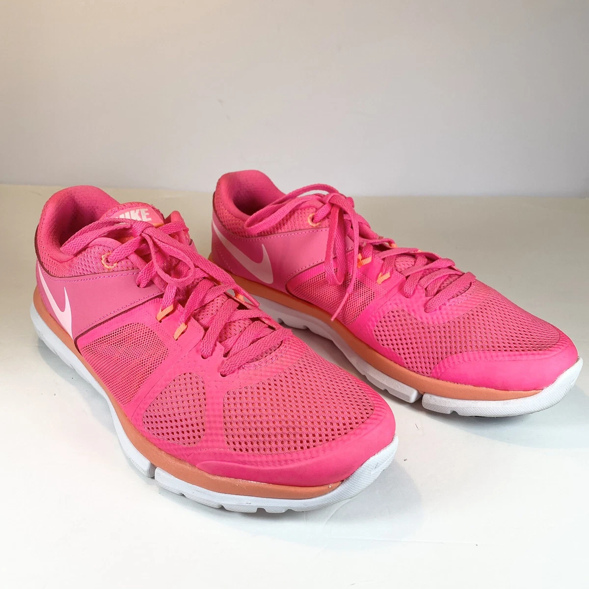 Shiny pink cheap nike shoes