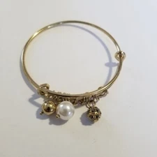 expandable gold tone bangle with faux pearl