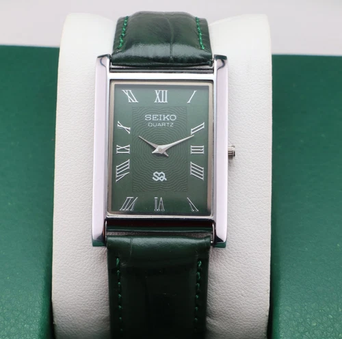 Vintage Seiko Slim Quartz Men's Wrist Watch Green Dial with Green Strap.