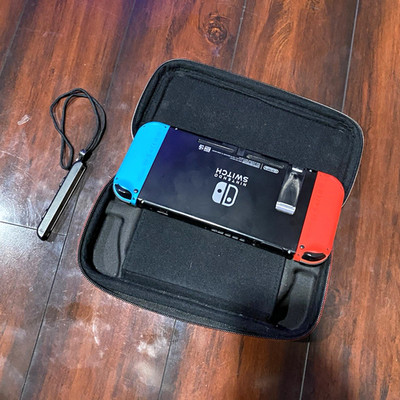 Nintendo Switch 32GB Console Neon Red/Blue Joy-Con Carry Case + 5 Games
