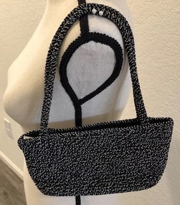 small white pocketbook