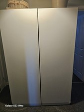 Storage Cupboard For Crafting. Has A Foldout Table,connected To The Unit.
