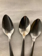 Three different brand stainless grapefruit spoons