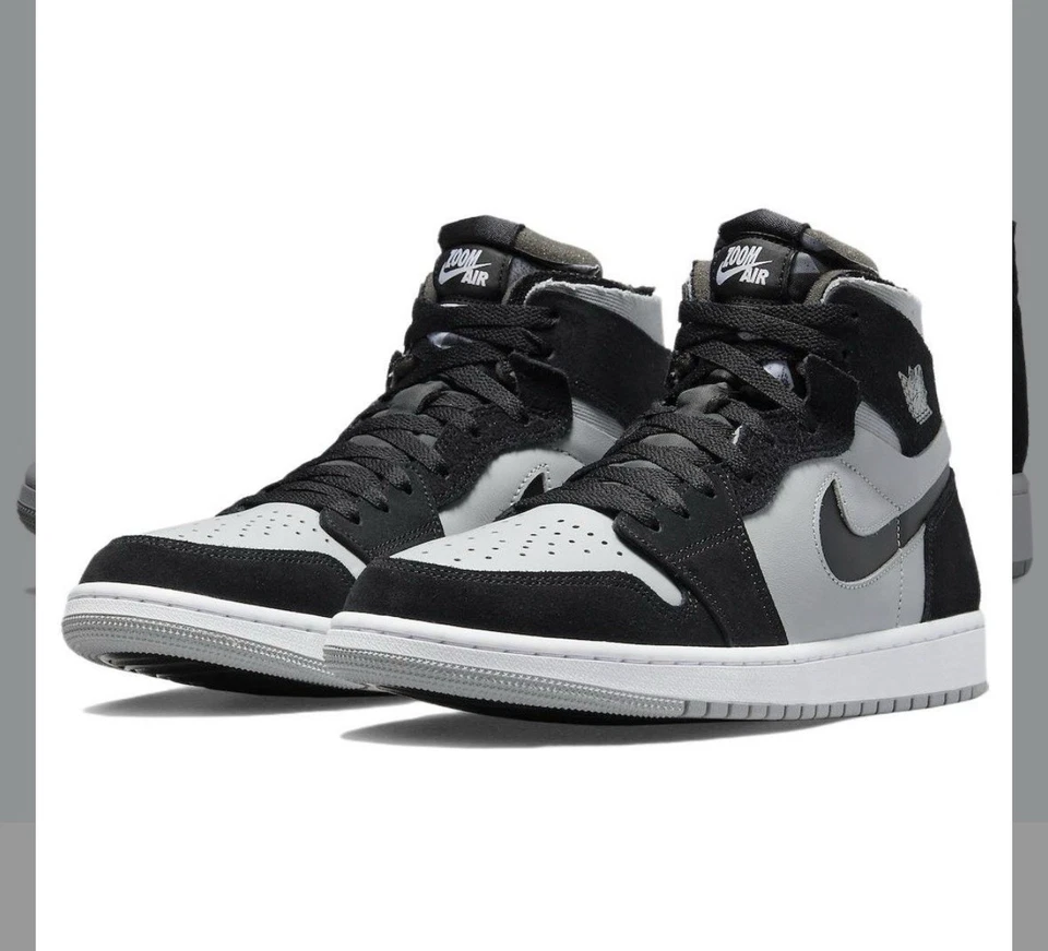 Nike Air Jordan 1 baskets montantes homme noir/gris/blanc EU 43 à lacets - Photo 1/4