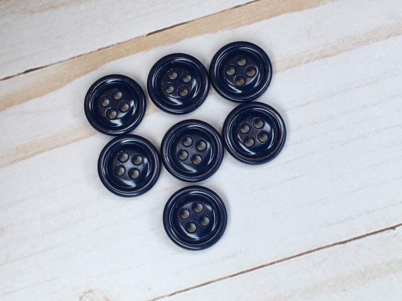 Dark blue/ navy- 4 hole-5/8" buttons- raised rim, curve back