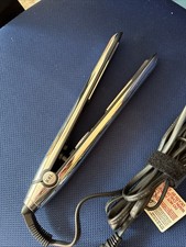 ion Titanium Platinum Silver Mirrored 1 Flat Iron. Model 301656. Works Well