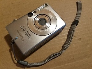 Cannon PowerShot SD100 AiAF ELPH 3.2MP Digital Camera PC1035 USB SD