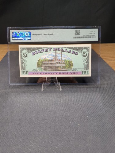 ๐ ๐ฅ โ
GradedGeekz --1987 $5 Disney Dollar Pippo PMG 66 EPQ (DIS3) ๐ฐ ๐ต๐ต - Foto 2 di 8