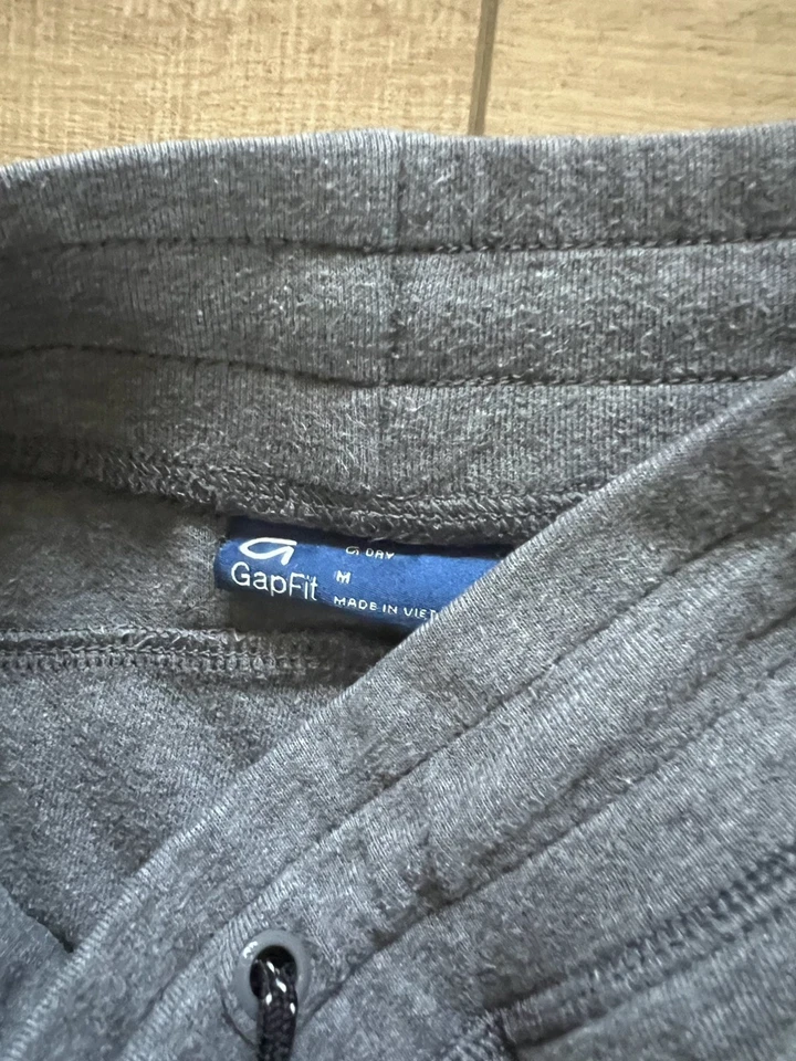 Pantalones deportivos con cordón gris Gap GapFit para niños talla M 8 bolsillos con cremallera Foto 4 de 4