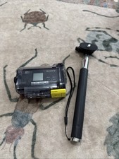 Sony HDR-AS15 rugged action Video camera with case And Monopod