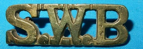 FINE WW1 ERA SWB SOUTH WALES BORDERERS REGIMENT SHOULDER TITLE BADGE GENUINE