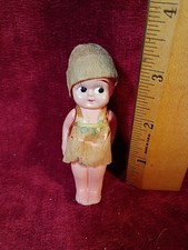 Vint 3.5 in celluloid girl with strung arms in crepe dress and hat made in Japan