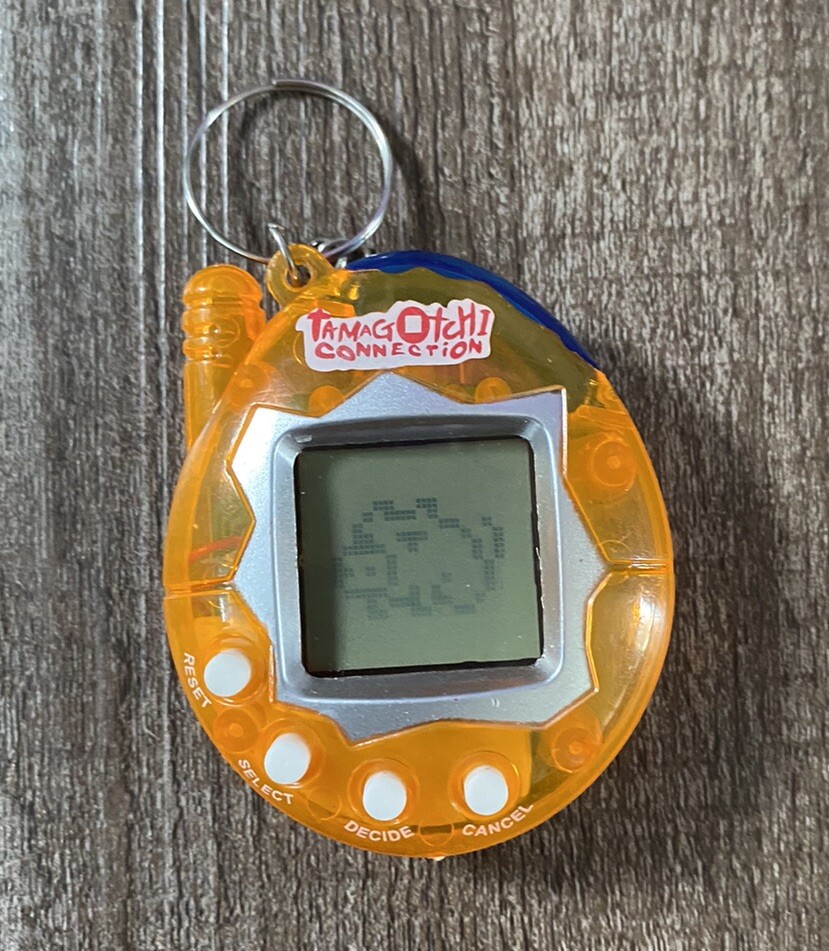 Tamagotchi Vintage Connection See-Through Orange Silver 4 Tamagotchi Vintage Connection See-Through Orange Silver 4