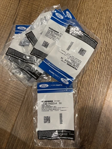 NEW OEM FORD PART LC3Z7H223A SEAL - 12