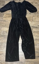 Girls size 10/12 Cat and Jack Romper black suede type material long sleeve
