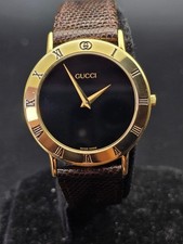 Gucci 3000M Vintage Quartz Dress Watch Gold Black Mens Classic Timepiece