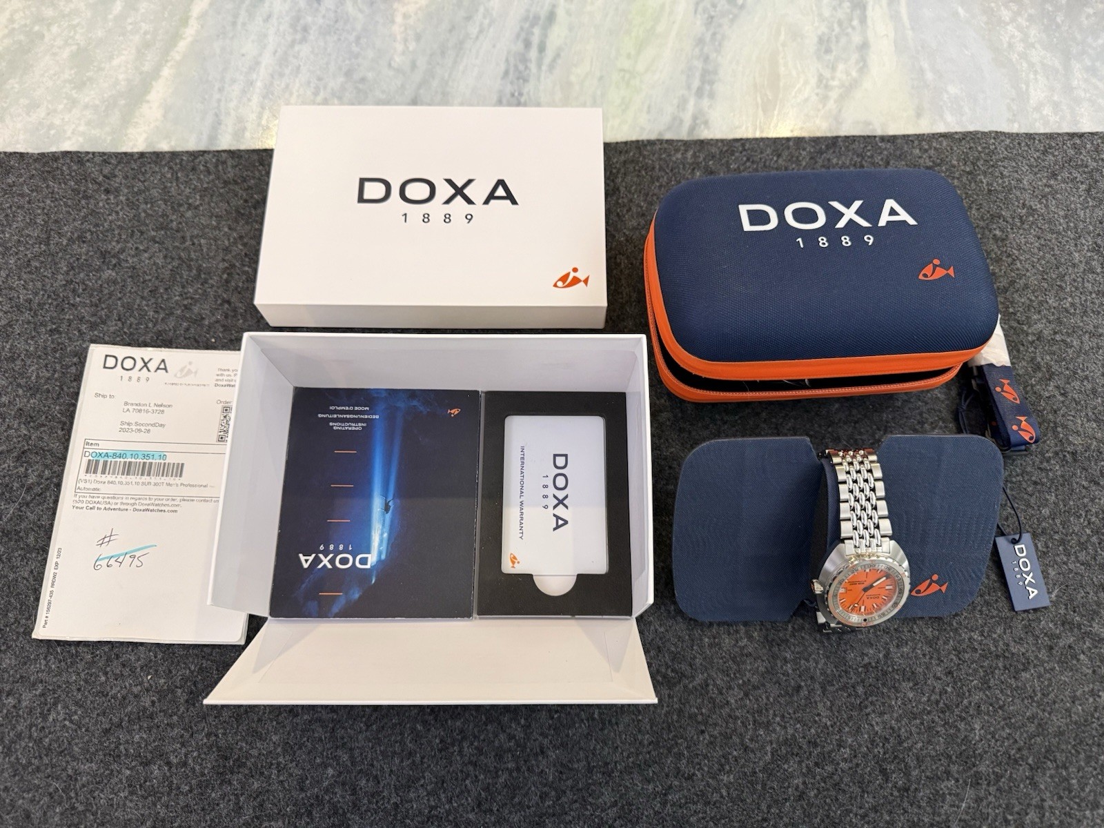 DOXA 300T Professional 840.10.351.10 Watch Orange Dial, Stainless Steel Bracelet