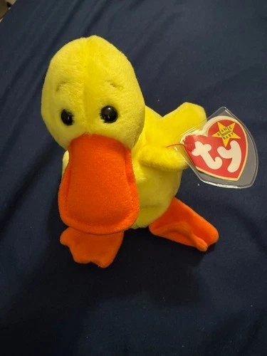 TY BEANIE BABY - QUACKER  BORN 1996 - WITH UNEXPLODED TAG IN ORIG PLASTIC COVER