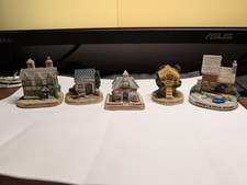 Collection of vintage Tetley Tea Folk Houses in original boxes, 1995