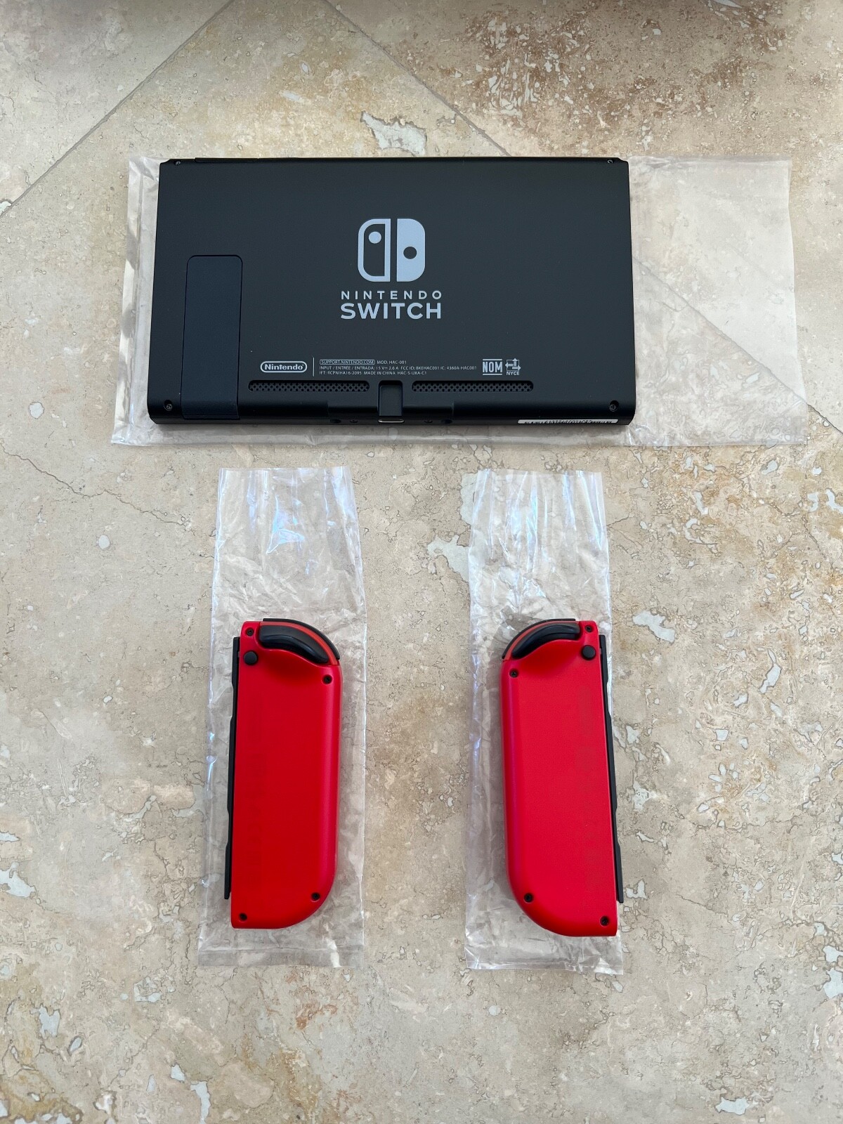 Nintendo Switch Super Mario Odyssey Edition (with Red JoyCons) 32GB