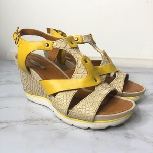yellow strappy shoes