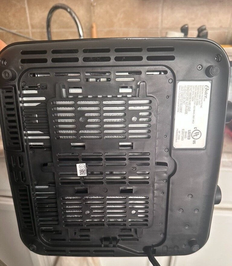 Tostadora Oster de 4 rebanadas con bagel y ajustes de recalentamiento y ranuras extra anchas Foto 4 de 4