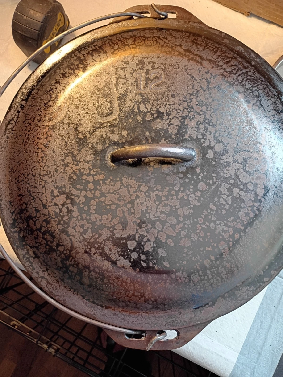 VINTAGE CAST IRON DUTCH OVEN #12 WITH LID.