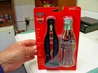 Coca Cola Ceramic Roller Ball Pen in Tin Cola Bottle shaped box. NOS