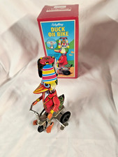 VINTAGE DUCK ON BIKE TIN TOY WIND UP